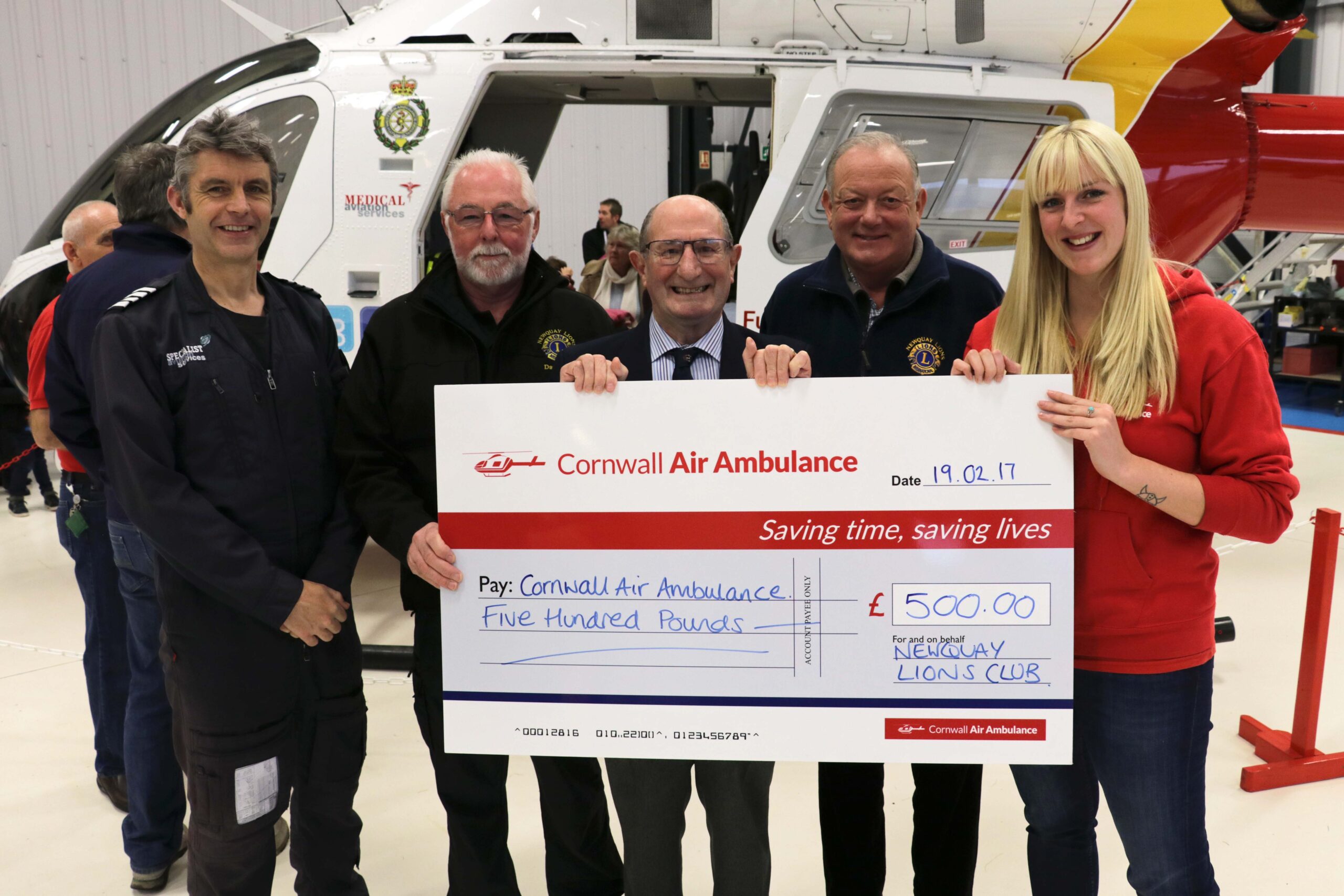 L-R Captain Criag Webster, David Hall (Newquay Lions), Denis Dent (Newquay Lions), Graham Wilmott (Newquay Lions) Becky Wise (Cornwall Air Ambulance fundraiser)