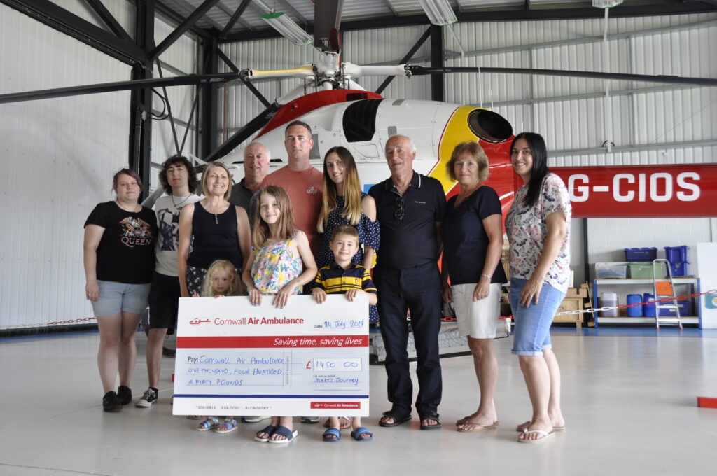 Matthew Lane centre returned to Cornwall with his family to thank Cornwall Air Ambulance