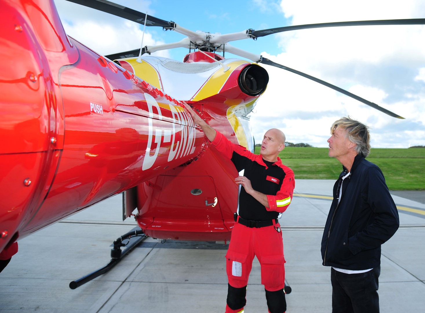Richard being given an overview of the helicopter from paramedic Mick Large