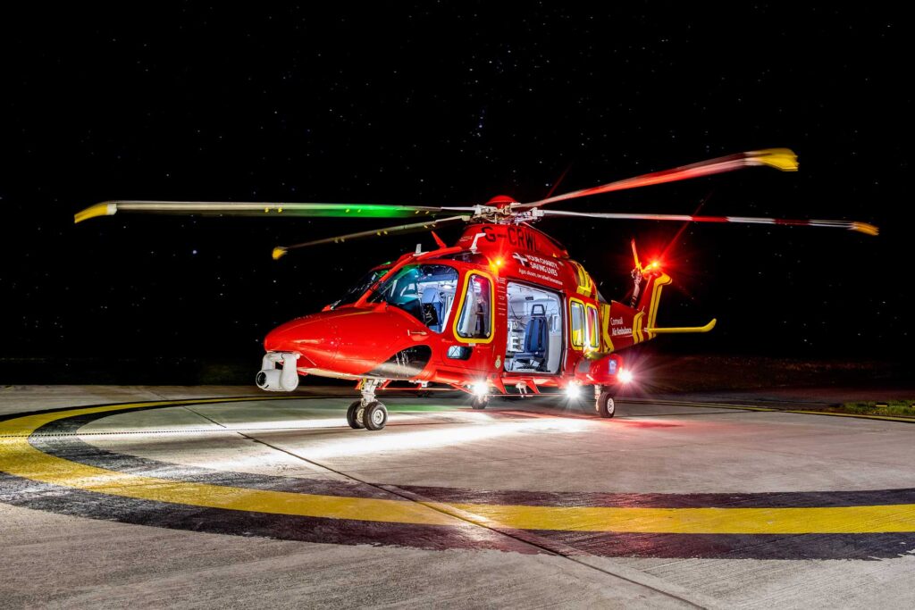 Helicopter On Helipad At Night