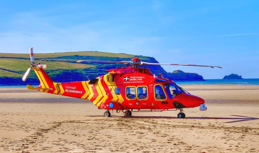 Cornwall Air Ambulance Leonardo Aw169 Helicopter Side On Landed On A Beach