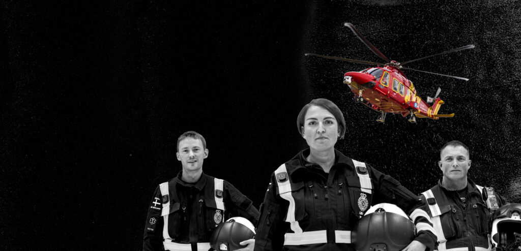Three paramedics and helicopter on blak background