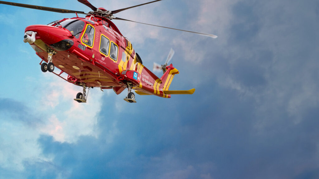 Helicopter Flying In Blue Sky