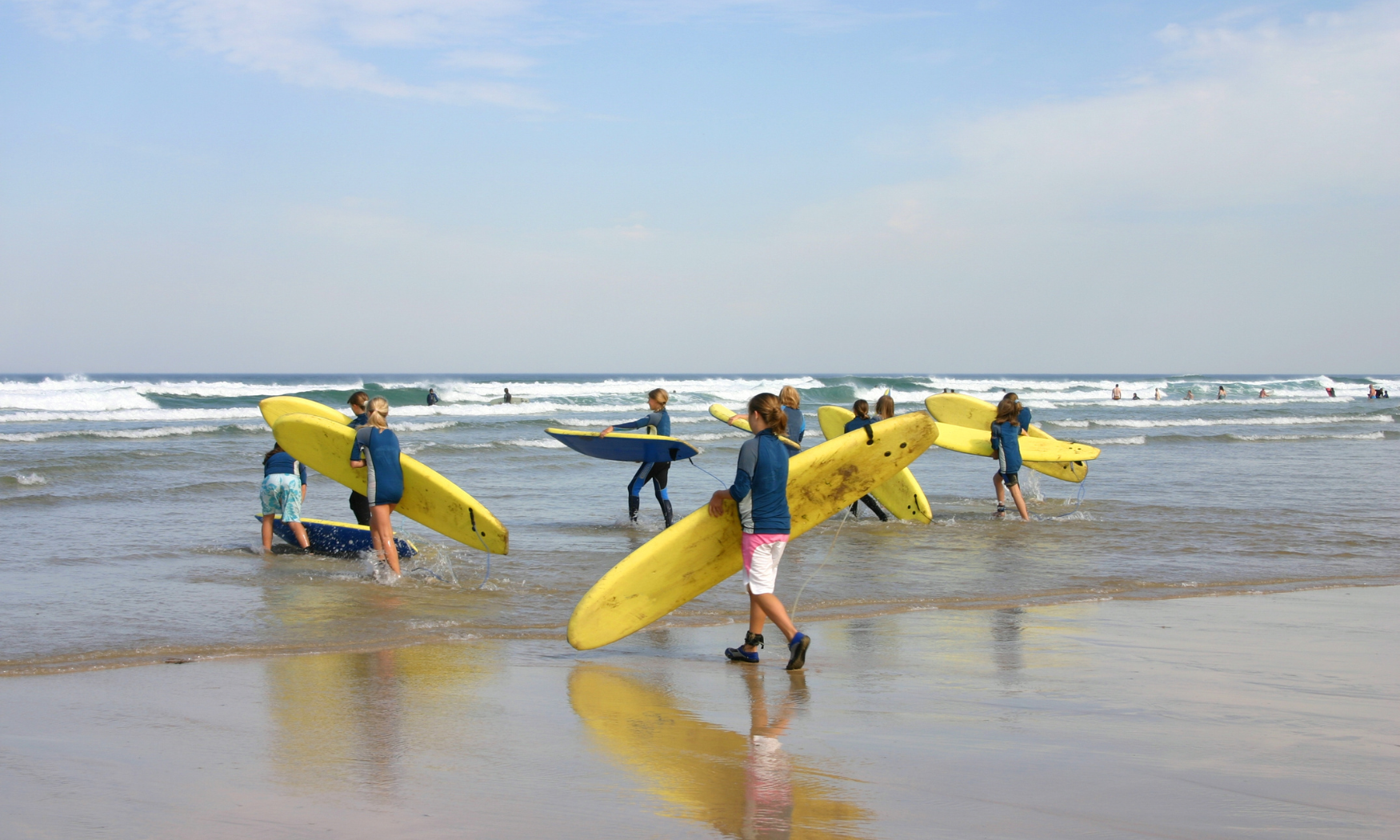 Surfers In The Water