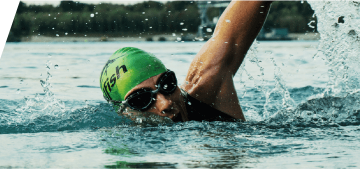 Swimmer in a lake doing front crawl