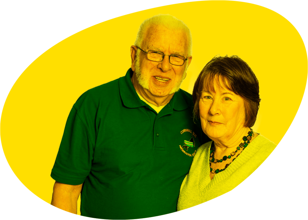 Yellow Egg Shape With Headshots Of Patient Alan And Wife